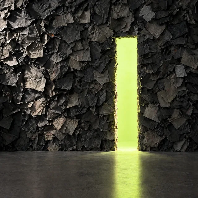 A lime-lit opening in a wall of discarded paper.